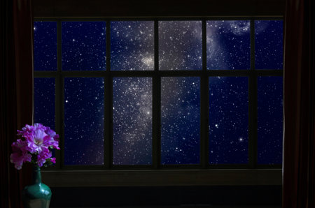 Beautiful bright stars in blue sky in glass window view