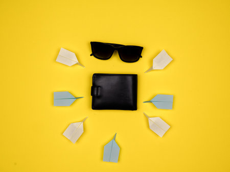 Wallet, shades, paper planes in flat layの写真素材