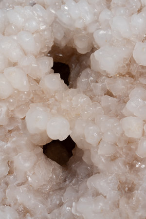 Funny close up of salt crystal with two wholes looking like eyes.