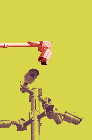 A security CCTV post with cameras installed in different directions on a bright and playful...