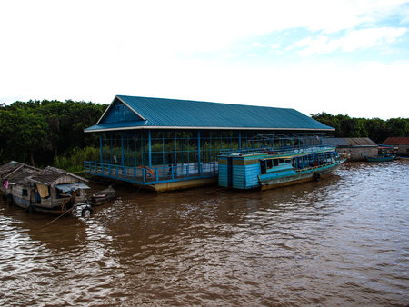 Cambodia Khmer Asia tourist attraction sky water port river travel house coast bank people Habitat ship の写真素材