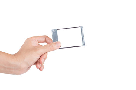 The man's hand handle with polaroid