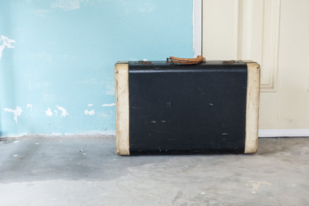 The old style baggage on the groundの写真素材