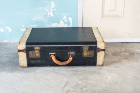 The old style baggage on the groundの写真素材