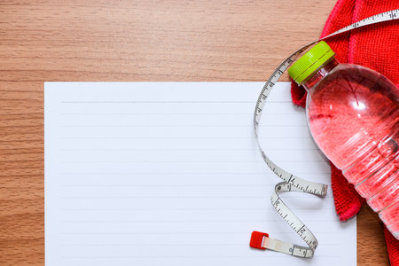 White line paper with sport equipments  to plan for your health, top viewの写真素材