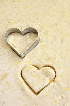 Making handmade heart shaped cookiesの写真素材