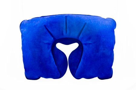Blue travel pillow isolated on a white backgroundの写真素材