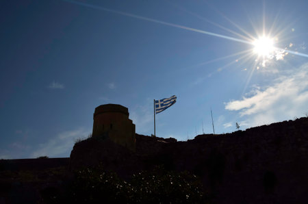 Greek flag on Palamidi forteness in Nafplion, Greeceの写真素材