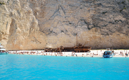 Shipwreck Beach famous Navagio beach in island Zakynthos full of touristsの写真素材