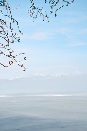 Snowy winter scene on the lake Orestiada in Kastoria ,Greeceの写真素材
