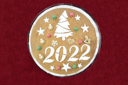 New year's cake for 2022 on red velvet tableclothの写真素材