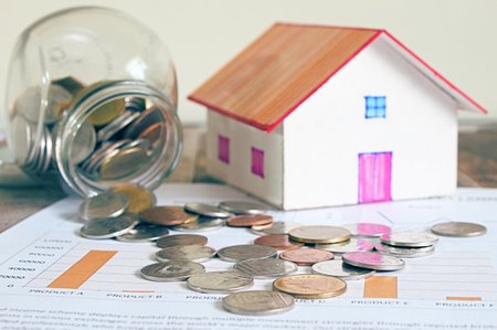 House model and book bank account and coin and data income sheet. の写真素材