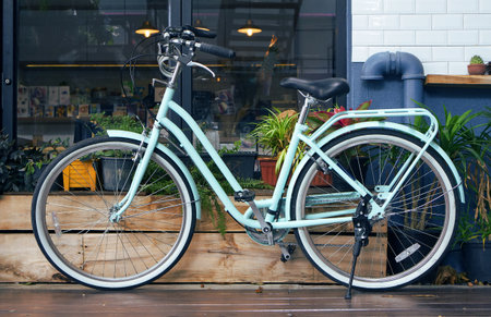 Vintage bicycle with background coffee shop.の写真素材