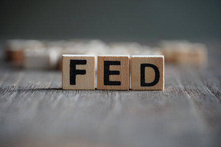 Word "FED"  on cube dice on wood tableの写真素材