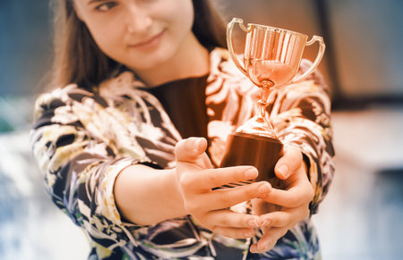 Business woman show trophy,win concept.の写真素材