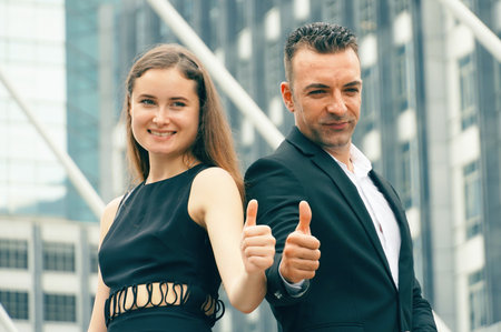 Businessman and customer show thumb up