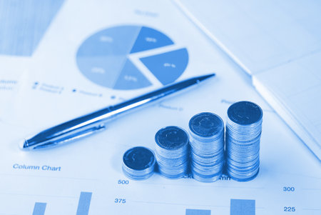Blue theme stack of coin on chart data paper , banking concept.の写真素材