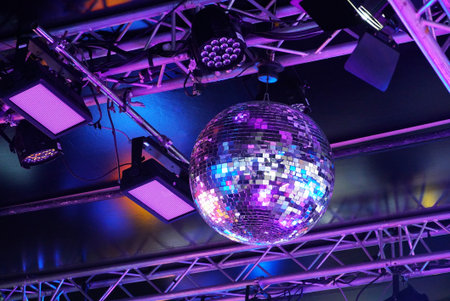 Mirror ball with purple lighting in the party
