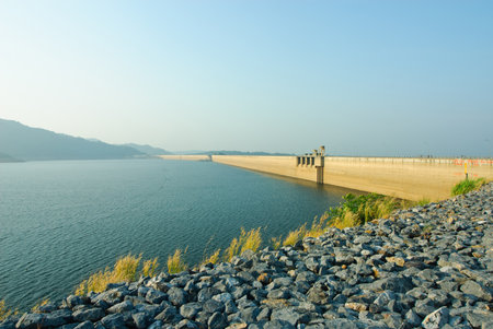 Sunrise at Khun Dan Prakarnchon Dam in Thailandの写真素材