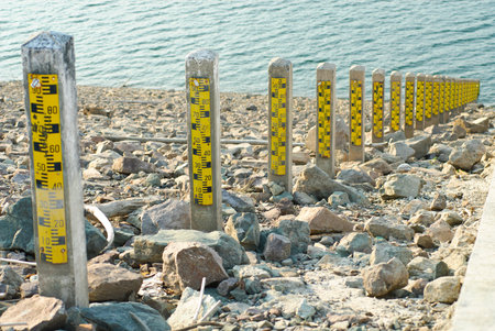Water Gage at Khun Dan Prakarnchon Dam in Thailandの写真素材