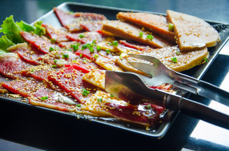 Tongs and beefの写真素材