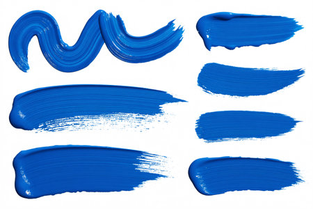 collection of blue paint strokes on a white background, perfect for adding artistic flair to designsの素材