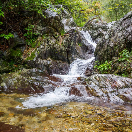 Huihang Ancient Trail Hiking Tour.  Image using slow shutter speed, waterfall and river in mountains between Anhui and Zhejiang, Chinaの写真素材