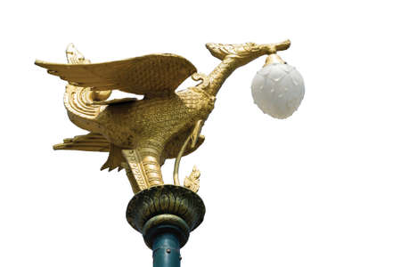 golden swan with lamp on isolate background.の写真素材