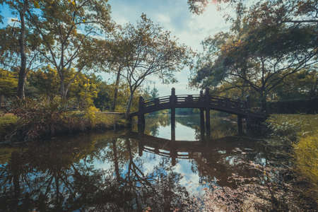 River bridge in autumn park Thailandの写真素材