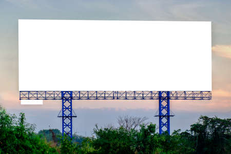 Blank billboard with sky at sunset ready for new advertisement.の写真素材
