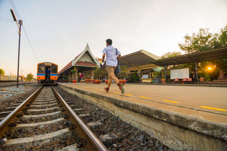 The boy rushed up trainの写真素材