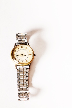 old watch on paper backgroundの写真素材