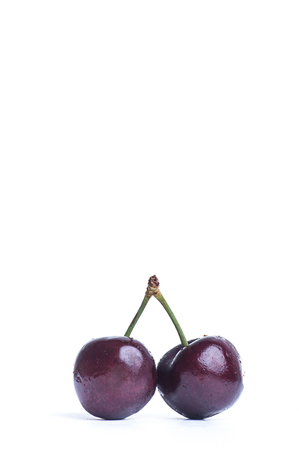 fresh cherry isolated on white backgroundの写真素材