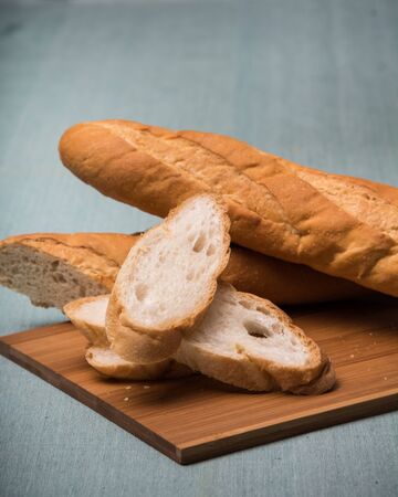 fresh bread on woodの写真素材