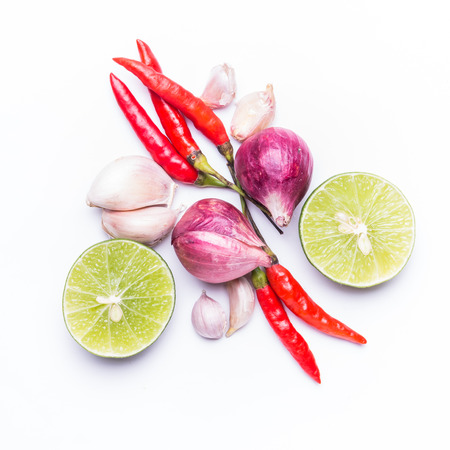 Chili and herbs isolated on white backgroundの写真素材