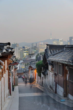 The Bukchon Hanok village at night in Koreaの写真素材