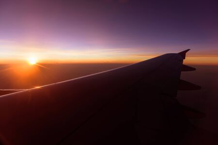 beautiful sunset on the plane , warm tone sunsetの写真素材