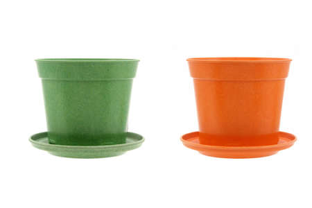 Generic flower pots in green and orange color on white backgroundの写真素材
