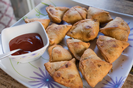 A samosa is a fried or baked pastry with a savory filling, made in home with less oil and custom...