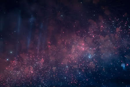 Sparks of night fireworks flying across the sky