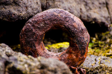 This is an image of an Iron Boat Ring at Portrush Harbour and is used for Mooring Boatsの写真素材
