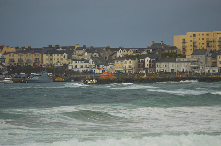 Portrush, Northern Ireland - August 31st 2013 - Stormy conditions looking over West Bay towards Portrush Harbour, Northern Irelandのeditorial素材