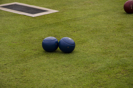This picture shows some bowling balls and a matt used in Lawn Bowls. Taken on August 20th, 2016 at Portstewart, Northern Irelandの写真素材
