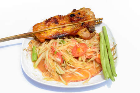 Papaya salad with grilled chicken の写真素材