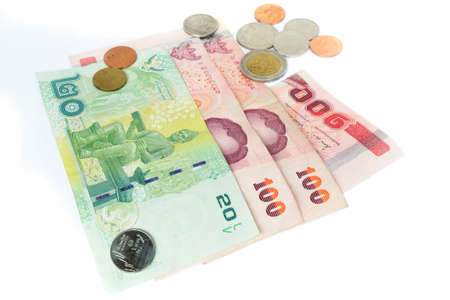 Thai banknotes on white background with Thai Coinsの写真素材