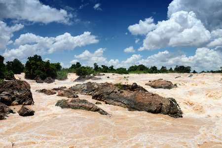Khone Phapheng Falls against blue skyの写真素材