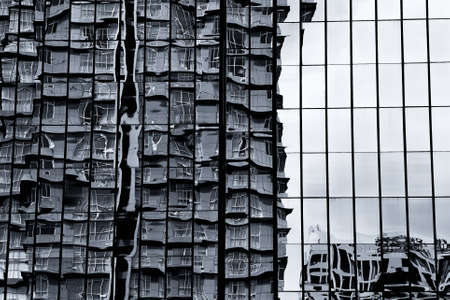 Black and white abstract of glass reflection buildingの写真素材