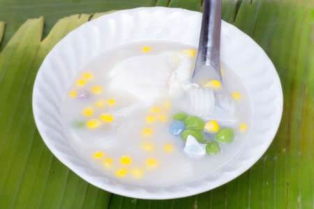 Dumplings in coconut cream with egg の写真素材