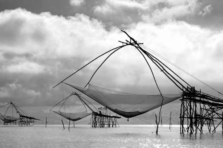 Black and White Water scape scene with square dip netの写真素材