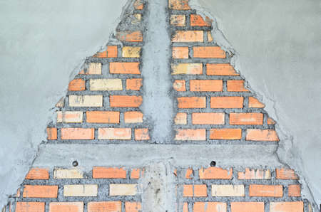 Inprogressing Brick wall at construction siteの写真素材